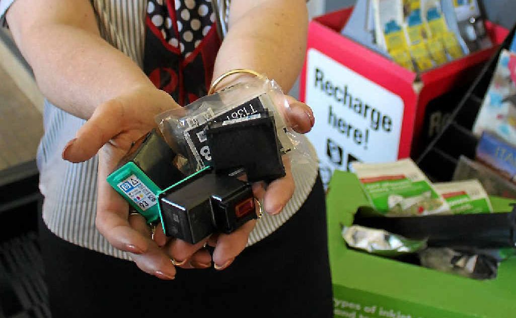 Australia Post’s Heather McGregor with another full box of cartridges for recycling.